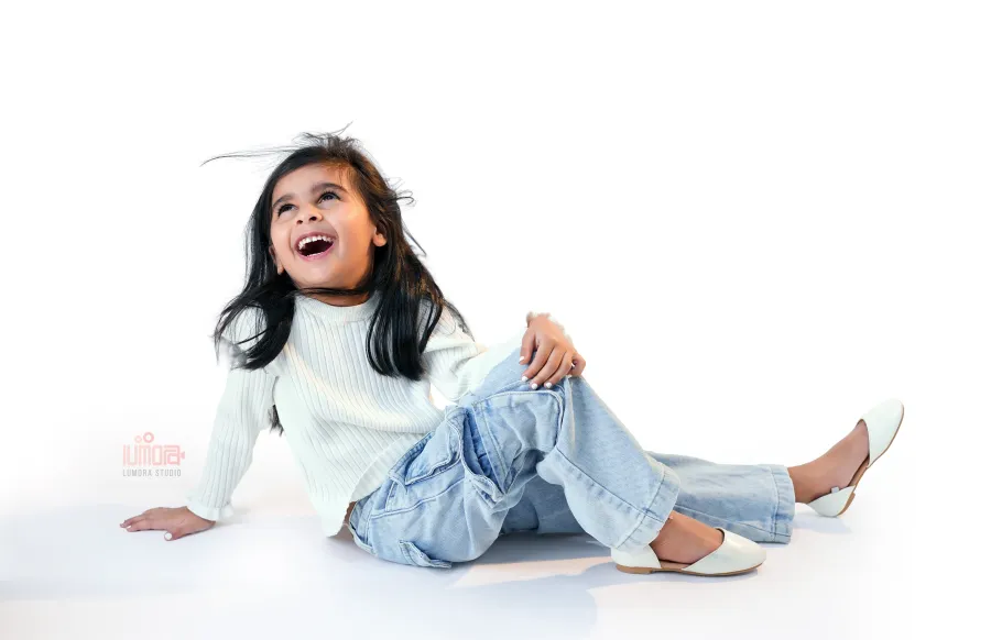 Every smile tells a beautiful story! Capture your little one's precious moments with professional kids photography at Lumora Studio. ❤️